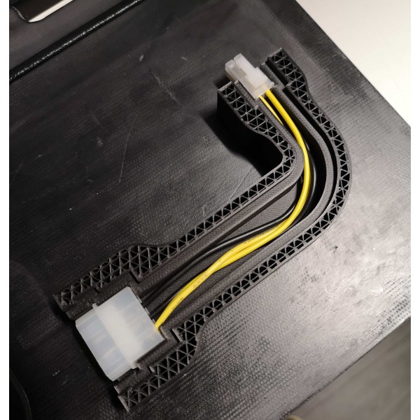 3D part with embedded electronic sensor in progress